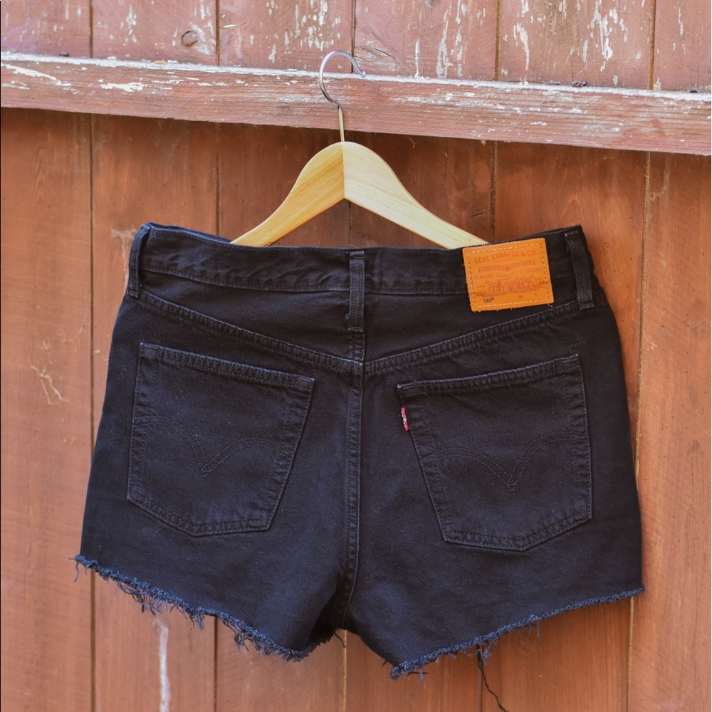 Black Levi 501 high rise distressed denim shorts